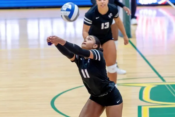 NU female playing volleyball