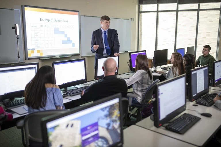 Niagara university professor teaching an mba class