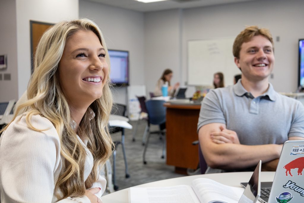 smiling blonde niagara university student